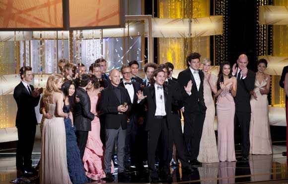 Glee-Golden-Globes. Colin Firth, winner of Best Performance by an Actor in a 