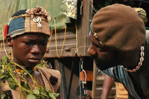 Abraham Attah and Idris Elba Beasts of No Nation